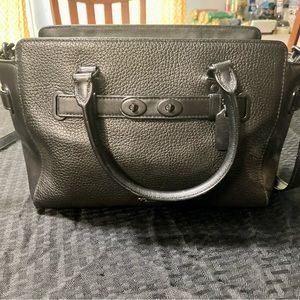 Coach black pebbled leather cross body purse with black hardware